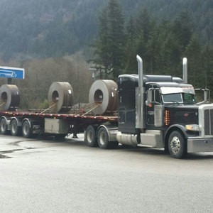 Specialized transport (moving steel, pipes, lumber)